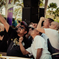 Maui Ag Fest 2014 Live Chefs’ Cook-Off Challenge selfie moment. Chefs, left to right: Pierre Lamielle (FoodOnYourShirt.com); Sheldon Simeon (Migrant); Jessica Pelland (charbar); Joey Macadangdang (Roy's); Isaac Bancaco (Ka‘ana Kitchen); Jojo Vasquez (The Plantation House); Eric Faivre (Grand Wailea), in black, leaning over. Not visible (and probable owner of the apparently owner-less hand on the left): Jeff Scheer (Maui Executive Catering). © 2014 Sugar + Shake